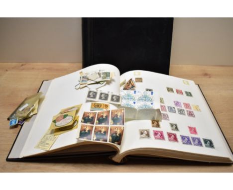 Two folders containing a quantity of various stamps, to include Argentina, Canada, Republique Du Congo, World Cup 1966, Malay