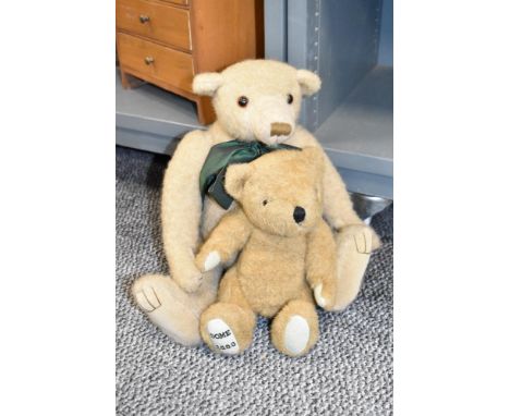 A vintage fully jointed teddy bear having green bow tie, h29cm, sold together with another teddy bear, ( 2 )