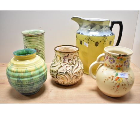 A Tuscan Decoro pottery jug, hand painted with floral patterns on a yellow ground, painted pattern number to base 'D358/817',
