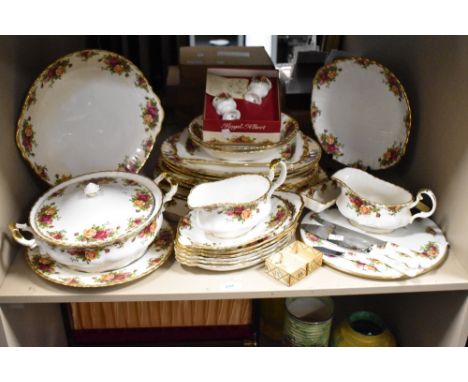 A Royal Albert Old Country Rose pattern part dinner service, decorated with gilt edge and floral designs on a white ground, t