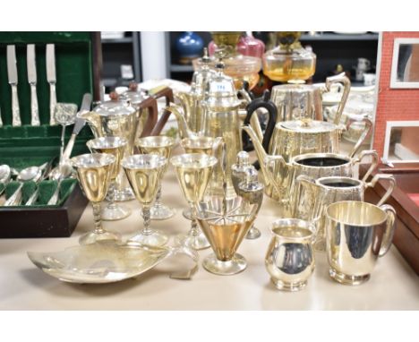 A part silver plated dinner service decorated with floral patterns, to include coffee and tea pots, salt and pepper shaker ec