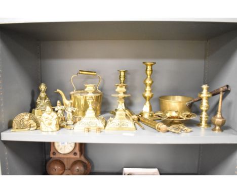 A pair of brass candlesticks having floral decoration, h15cm, sold together with a selection of other brass wares including a