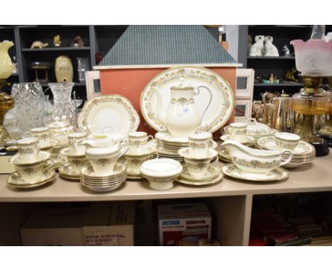 A large Aynsley Henley pattern ceramic dinner service, decorated with gilt edge and floral patterns on a cream ground, to inc