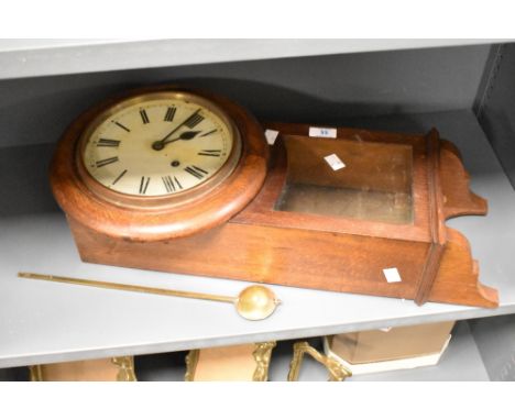 An early 20th century German Winterhalder and Hofmeier oak cased chiming drop-dial wall clock, the circular dial with Roan ho