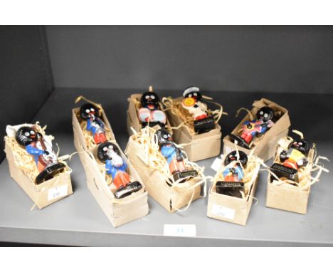A collection of eight Robertson's Jam 'Band' figures, each modelled playing musical instruments, and sold with one 'Lollipop'