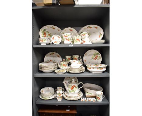 A Queens fine bone china 'Virginia' pattern dinner service, decorated with strawberry's and foliage on an ice white ground, t
