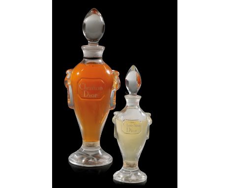 CHRISTIAN DIOR: A 'MISS DIOR' AMPHORA FORM SCENT FLASK apparently still sealed, 20.75cm high; together with a smaller example