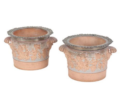 A PAIR OF SPODE EARTHENWARE WINE COOLERS each decorated in relief with trailing vines, with silver plated gadrooned mounts to