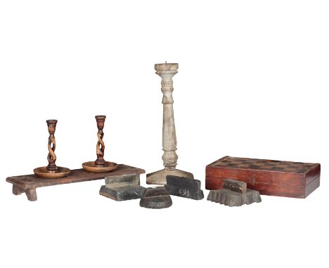 A COLLECTION OF TREEN including a chequers board, two barley twist candlesticks, 21cm high, a pricket candlestick, 46cm high,