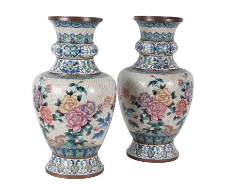 A PAIR 20TH CENTURY CLOISONNÃ‰ VASES decorated with flowers on a white scale ground, within lappet borders, each 64cm high