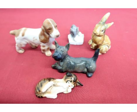 Royal Copenhagen model of a spaniel, a terrier and a mouse, a Royal Doulton model of a tabby kitten and a model of a rabbit s