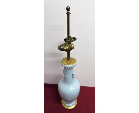 Celadon type glazed Chinese vase, converted to an electric table lamp, with twin branch adjustable light fitting, on gilt bas