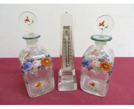 Clear glass obelisk (H15.5cm) with  inset thermometer with a pair 19th C glass square form bottles with hand painted floral p