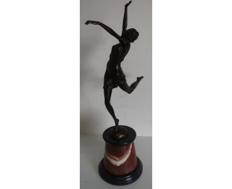Bronze model of a dancing girl, after Bruno Zach, on circular tapering marble base (H65cm) 