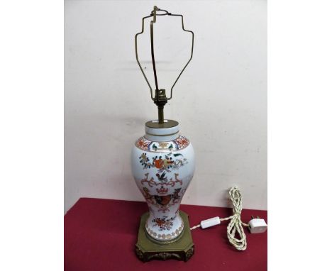 Armorial ceramic vase converted to electric table lamp with elaborate brass base (cracks to rim) (H60cm) 