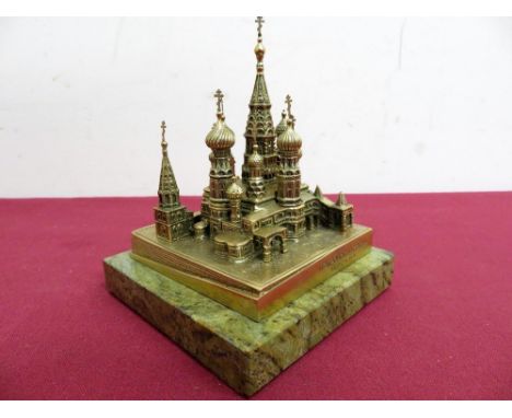 Unusual Russian gilt bronze model of St Peters Cathedral with markings, signed and date 1970, on square marble base (9.5cm x 