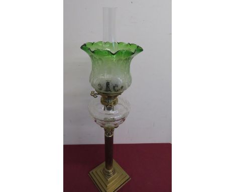 Large Victorian brass Corinthian column oil lamp, with clear glass reservoir and etched green shade on stepped square base (H