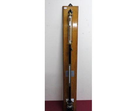 Negretti &amp; Zamra of London brass stick barometer on golden oak wall hanging plaque 