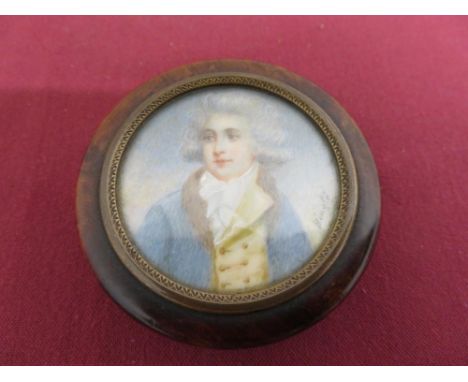 A turned walnut circular snuff box, the lid with a miniature portrait of a gentlemen  on ivory- signed Bingle. (D6cm) 