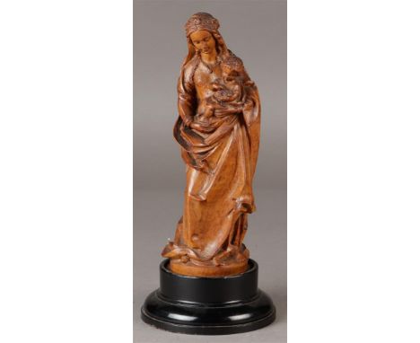 A stabbed Mary with child. First quarter of the 20th century.H.: 30 cm. (incl. sokkel).