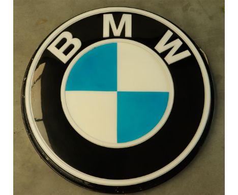 A large plastic BMW advertising light box.Diam.: 97 cm.
