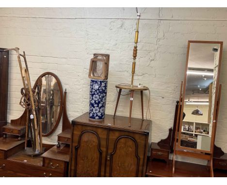 Two framed bevelled wall mirrors, copper warming pan, cheval mirror, standard lamp, two stick stands, sticks, tennis racquets