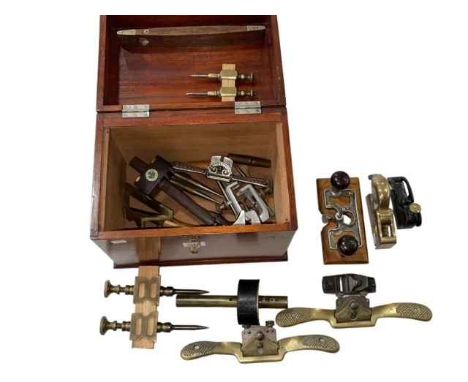 Box of vintage tools including planes, gauges, spoke shaves, etc.