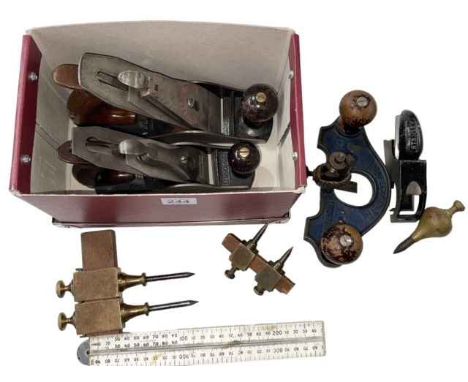 Box of vintage tools including planes.