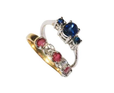 Ruby and diamond five stone 18 carat gold ring, size L, together with three stone sapphire ring (2).