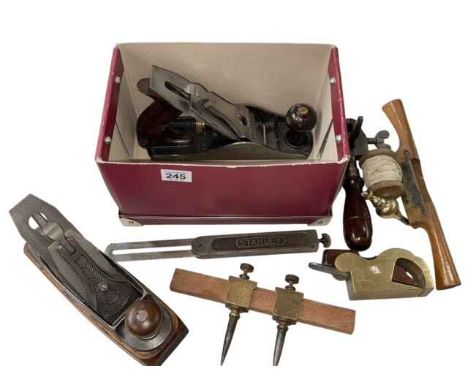 Box of vintage tools including planes.