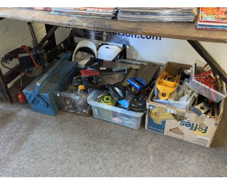 Collection of tools, helmets, oil cans, etc.