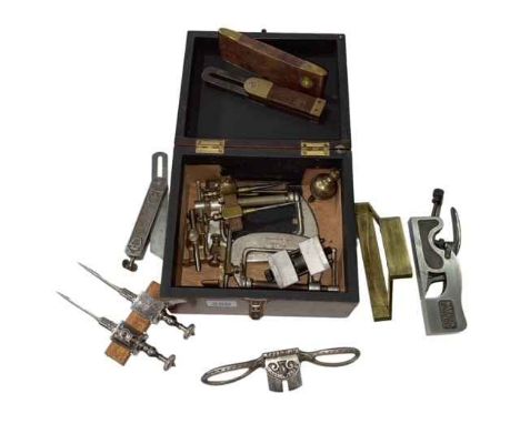 Box of vintage tools including levels, spoke shaves, etc.