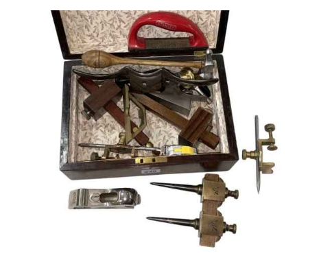 Box of vintage tools including spoke shave, plane, gauges, etc.