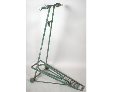 A Reproduction Wrought Iron Boot Pull with Ceramic Handles, 90cm high 