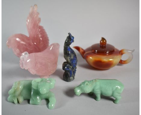 A Collection of Five Oriental Carved Pink Stone, Jadeite and Iridescent Stone Animals and Birds Together with a Teapot 