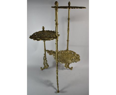 An Oriental Brass Offset Three Shelf Plant Stand, 76cm high 