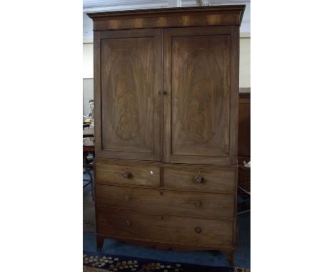 A Mid 19th Century Inlaid Linen Press, the Base with Two Short and Two Long Drawers on Bracket Feet, Panel Doors to Top Secti