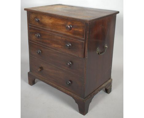 A Mid 19th Century Mahogany Commode in the Form of a Four Drawer Chest, 69cm wide 