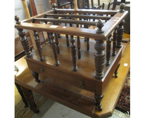 Early 20th Century mahogany canterbury on baluster turned legs and ceramic casters. (B.P. 24% incl. VAT)