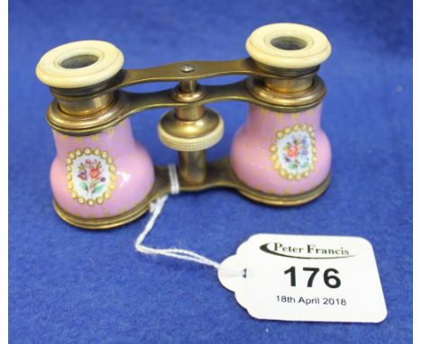 Pair of French yellow metal opera glasses with gilded pink ceramic mounts, having floral painted cartouches. (B.P. 24% incl. 