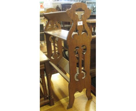 Early 20th Century oak book trough with carved pierced supports.(B.P. 24% incl. VAT)   CONDITION REPORT:  56 x 85 x 28 cm.Sta