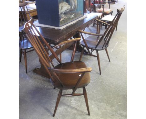 Mid 20th Century oak draw leaf refectory type table, together with a set of four Ercol type spindle back chairs (2+2) (5)(B.P