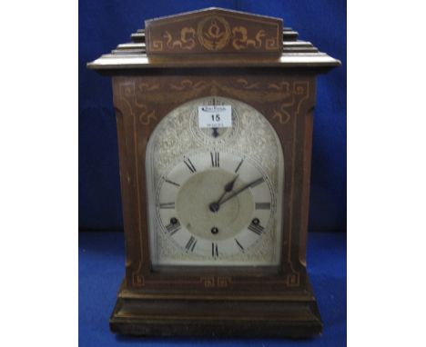 Edwardian inlaid mahogany three train architectural mantel clock with silvered face, having German striking movement.  42cm h