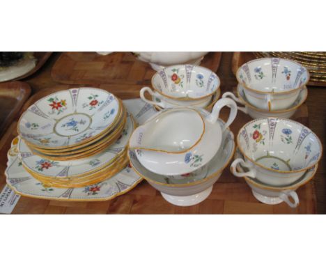 21 piece Shelley china tea service on white ground with enamelled floral decoration.(B.P. 24% incl. VAT)