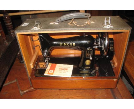 Vintage Singer sewing machine class 99K with instruction manual in fitted case. (B.P. 24% incl. VAT)