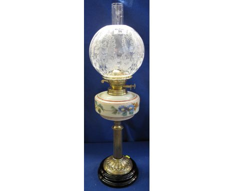 Brass double burner oil lamp with painted glass reservoir on brass pedestal with ceramic base, etched glass shade and clear c