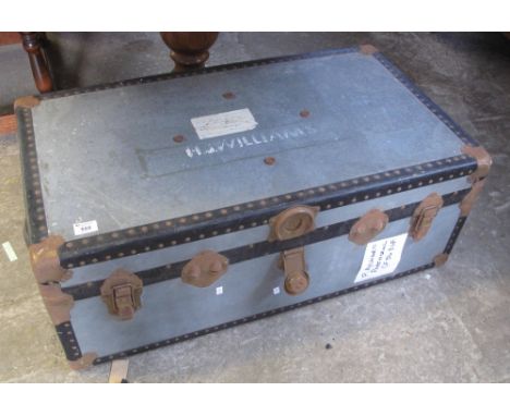 Vintage tin and metal banded two handled trunk.(B.P. 24% incl. VAT)