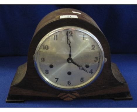 Mid Century oak, hat shaped, three train mantel clock.(B.P. 24% incl. VAT)