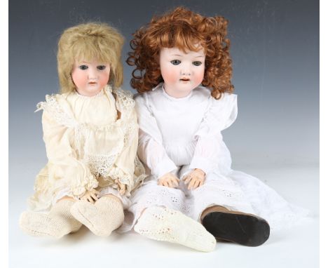 A Heubach Köppelsdorf bisque head doll, impressed '250·7', with later brown wig, sleeping eyes, open mouth showing upper teet