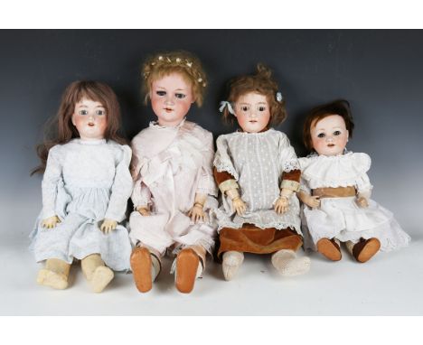 Three Armand Marseille bisque head dolls, each impressed '390', two with sleeping eyes, the other with fixed blue eyes, all w